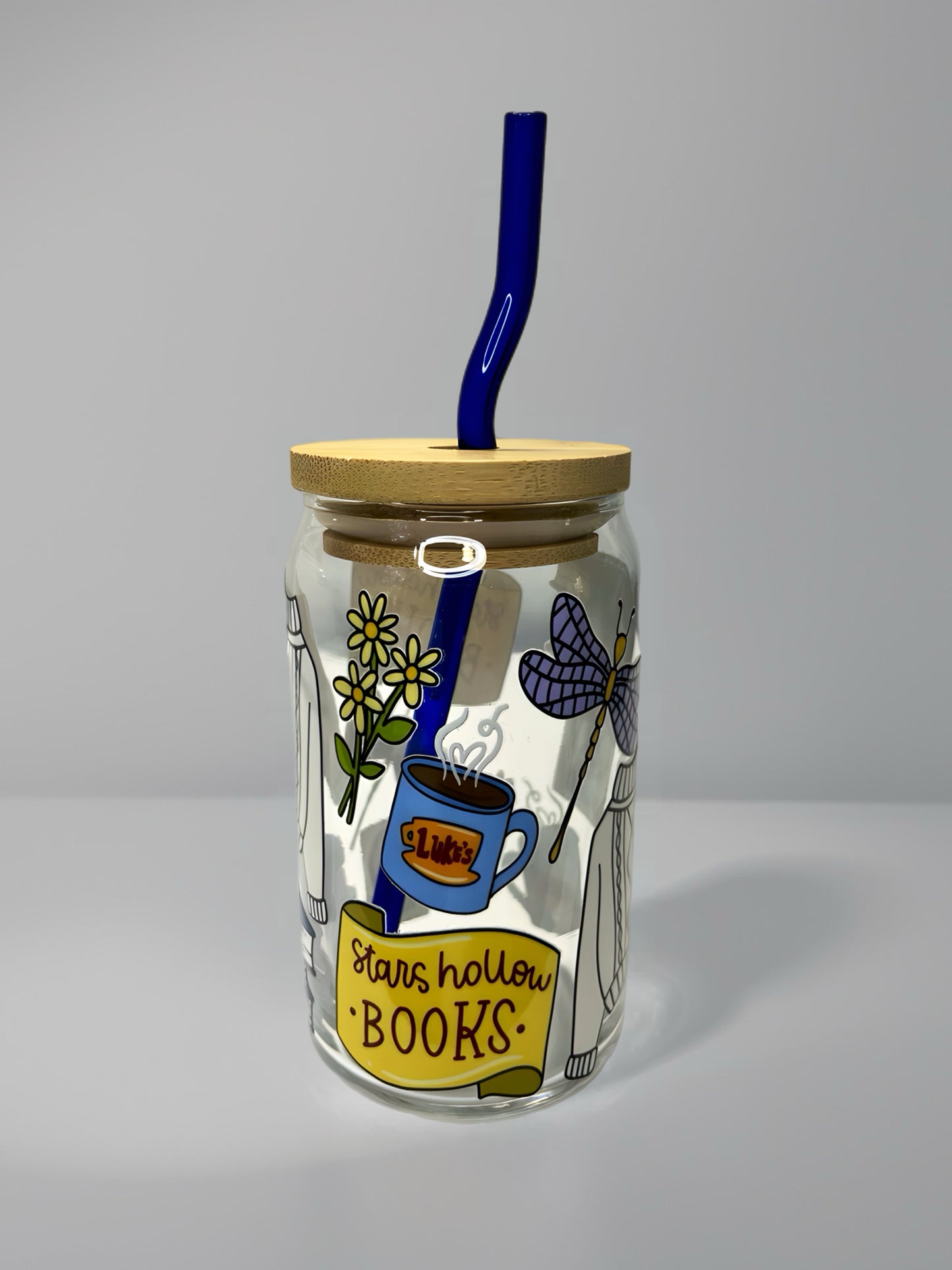 Stars Hollow Books Glass Can Cup with Blue Glass Straw & Bamboo Lid | Cozy Book Lover UV DTF Cup